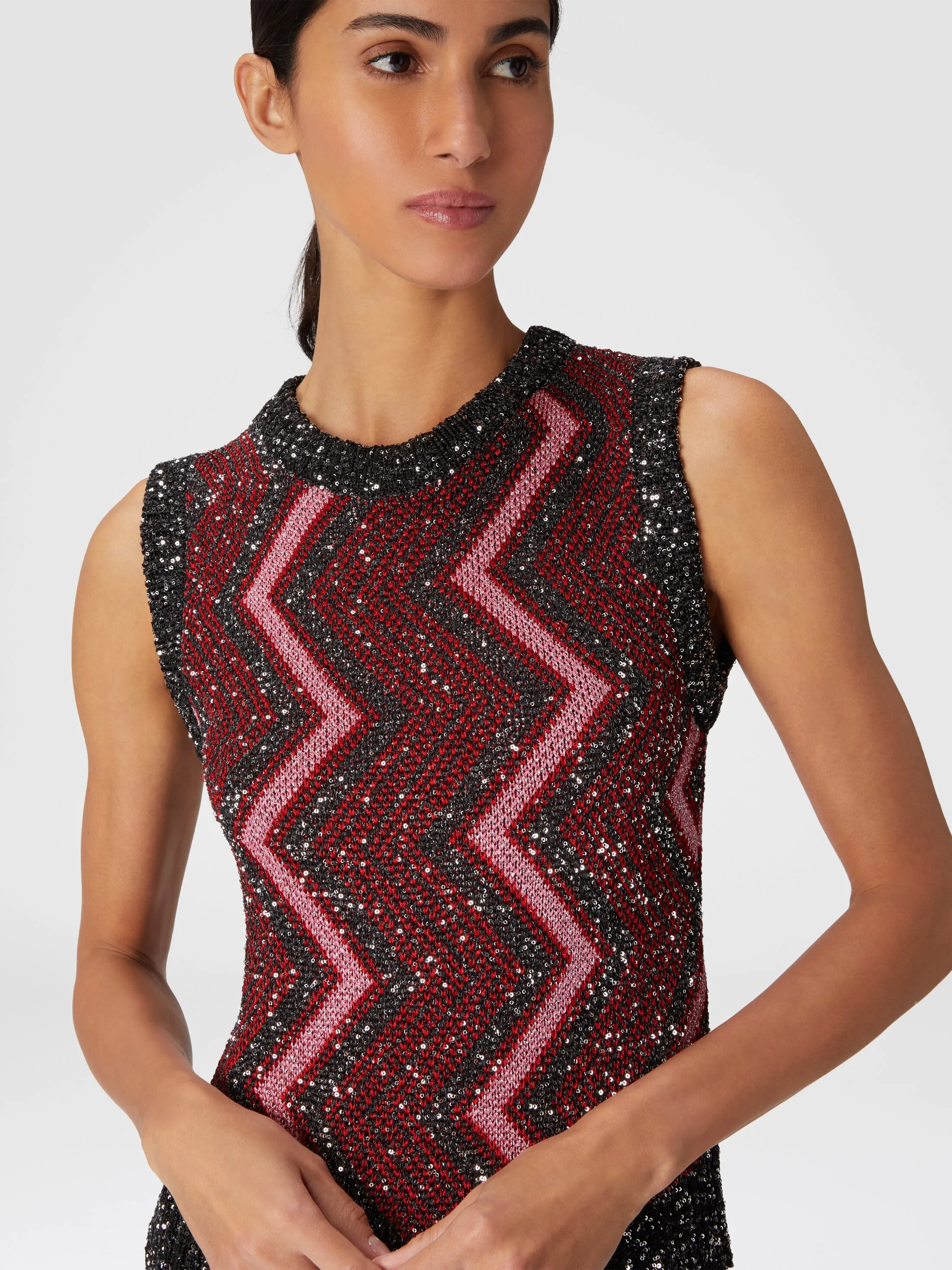 Gilet con macro zig zag e paillettes