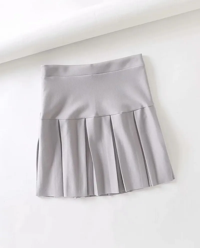 Minigonna a pieghe a vita alta da donna a 6 colori con chiusura laterale a zip Minigonne a pieghe elasticizzate con orlo grezzo