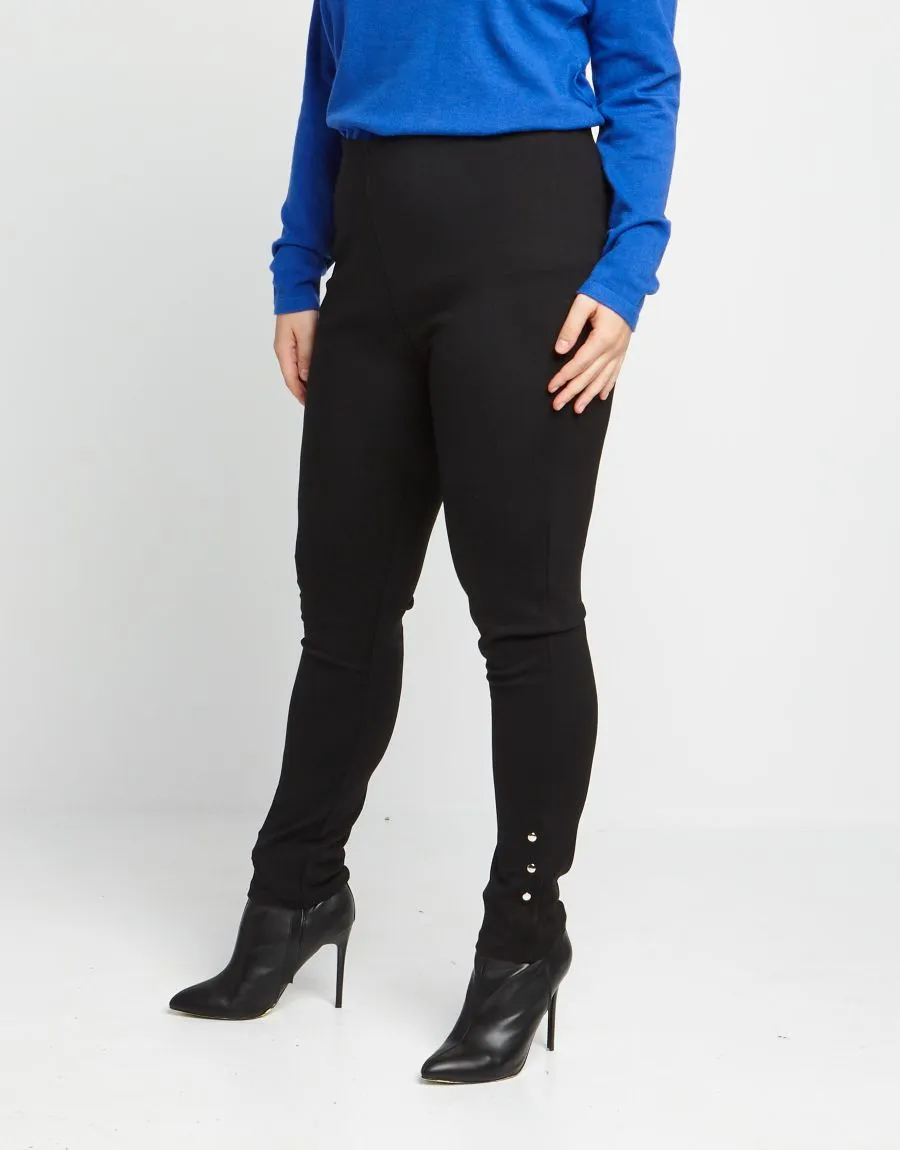 Pantalone con borchie