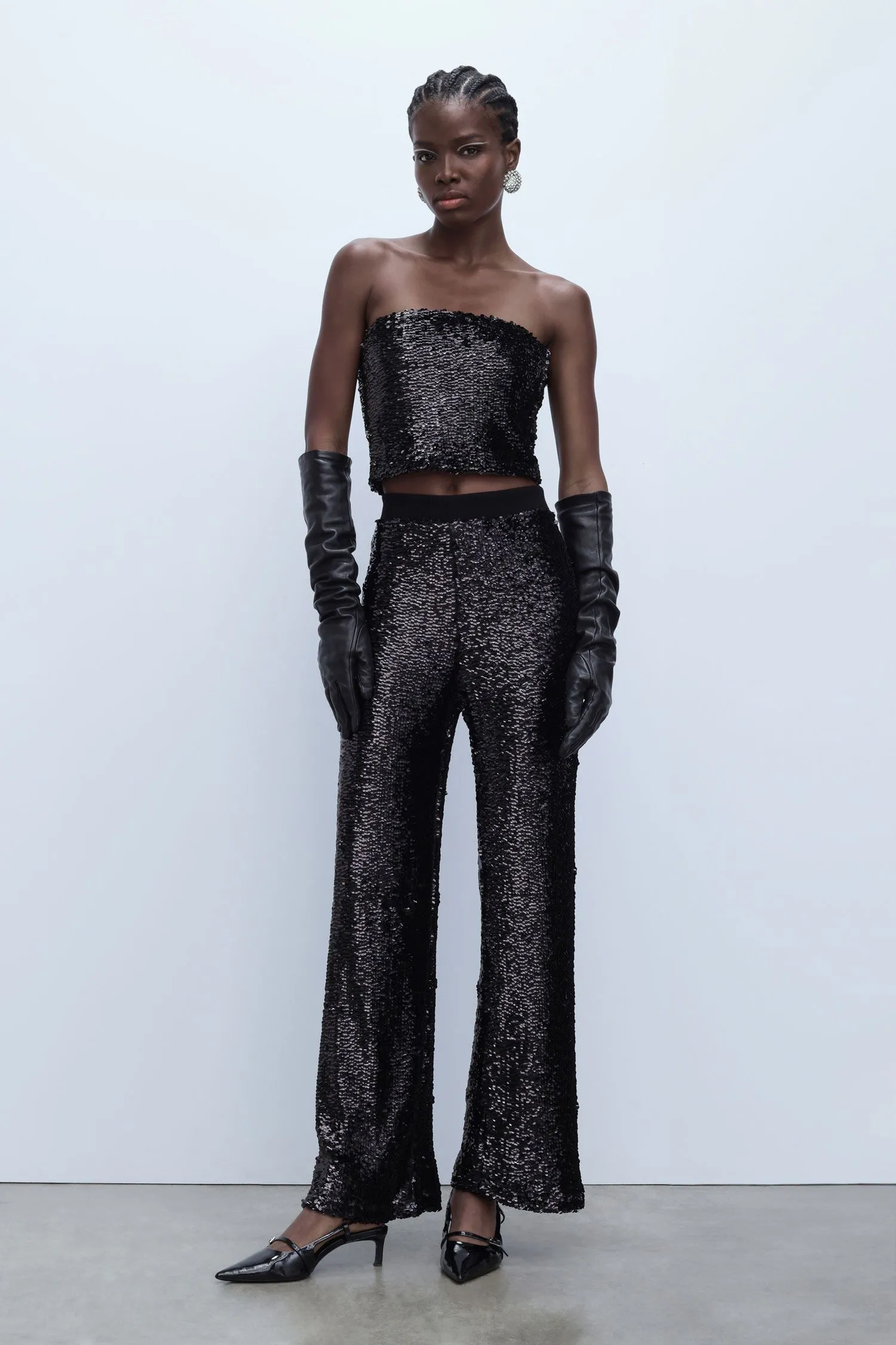  Pantaloni a zampa in paillettes     