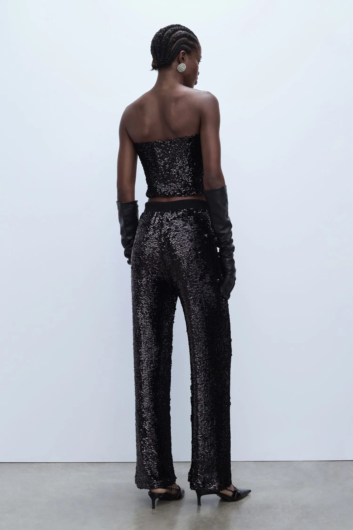  Pantaloni a zampa in paillettes     