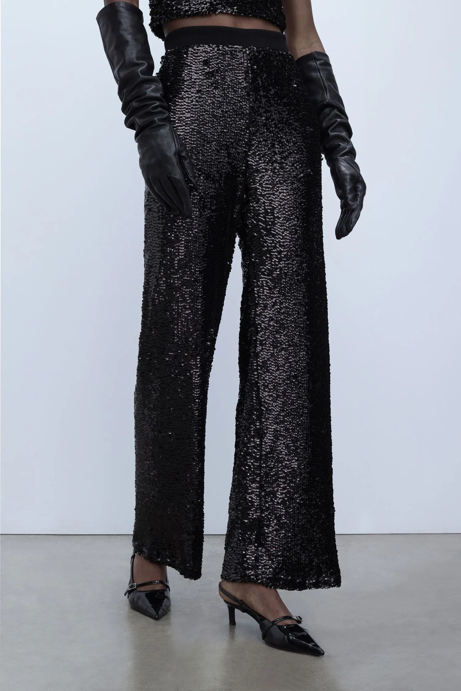  Pantaloni a zampa in paillettes     
