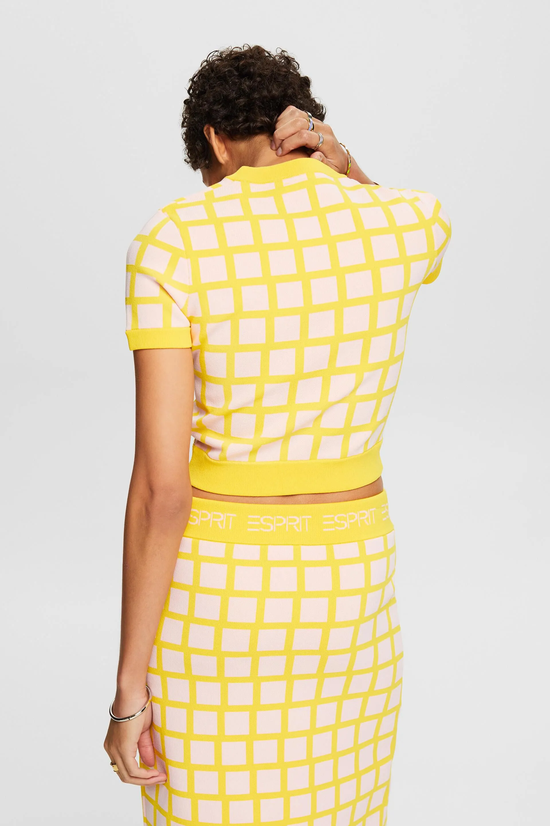Pullover cropped in jacquard a maniche corte